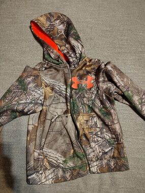 Under Armour Kids Realtree Camo Hooded Jacket with Orange Logo
